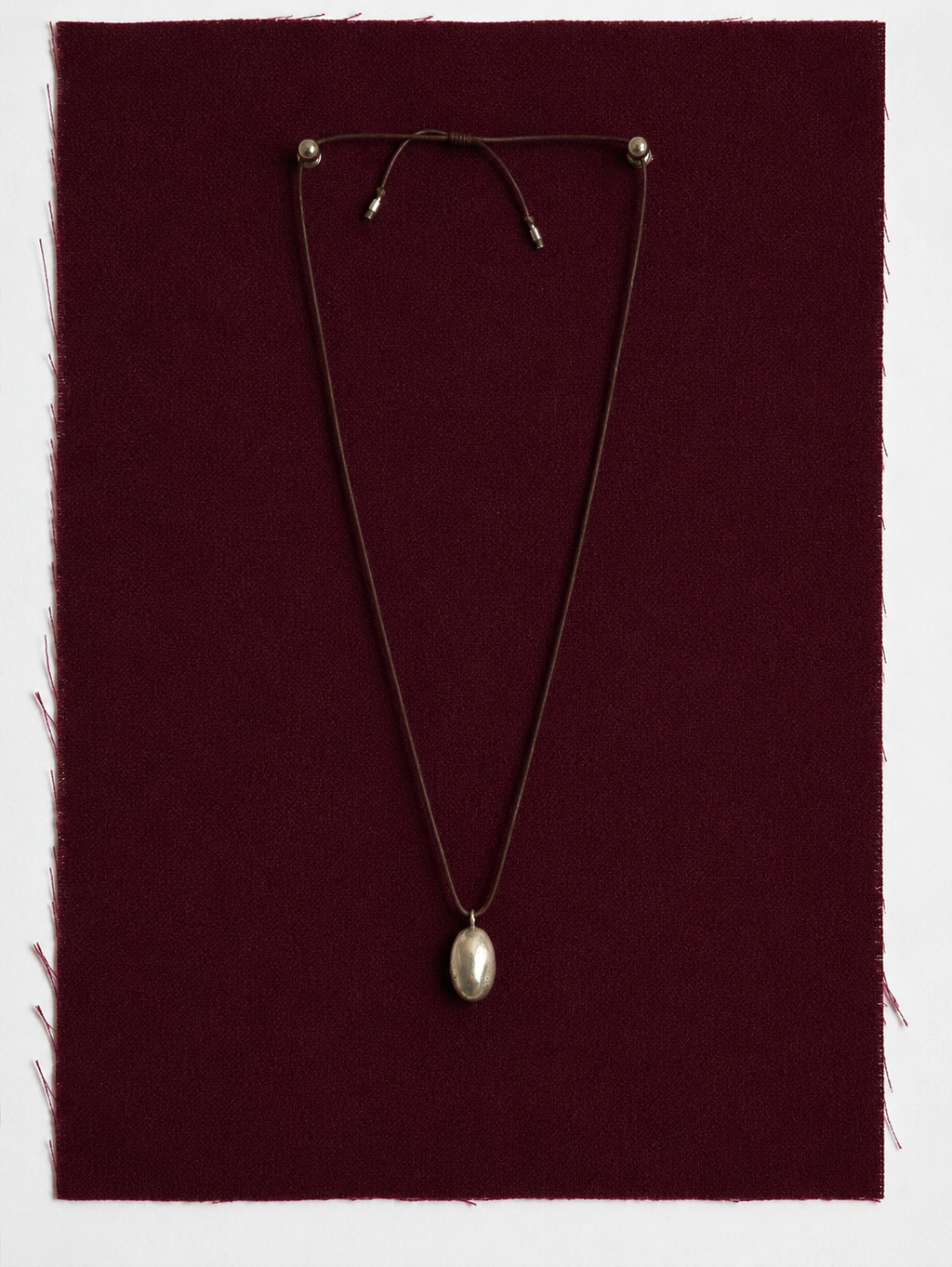 Silver "Huevito" String Necklace